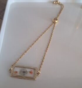 Adjustable gold flower bracelet