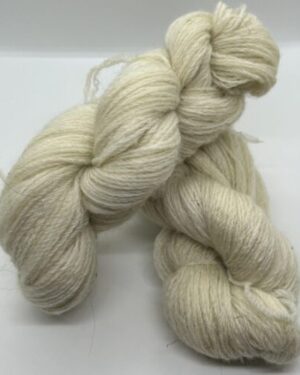 Two skeins of fine spun off white yarn.